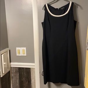 Black and gold dress with gold shoes